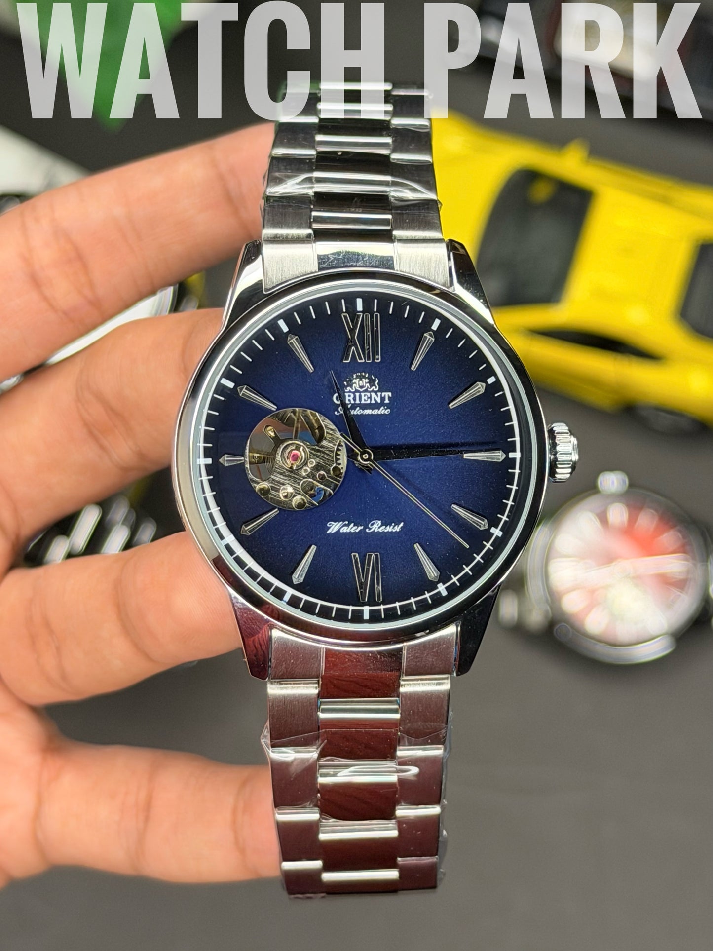Orient - Bambino Open Heart - Navy Blue dial - Silver chain