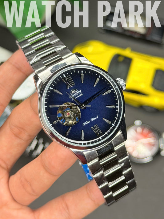 Orient - Bambino Open Heart - Navy Blue dial - Silver chain