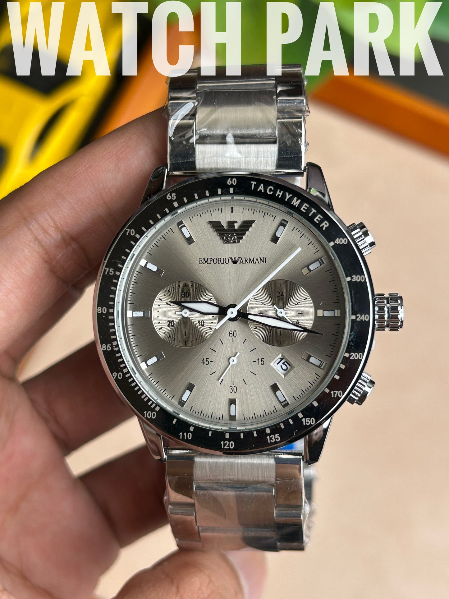 Emporio Armani - Champagne Sunray dial - Silver chain - Chronograph