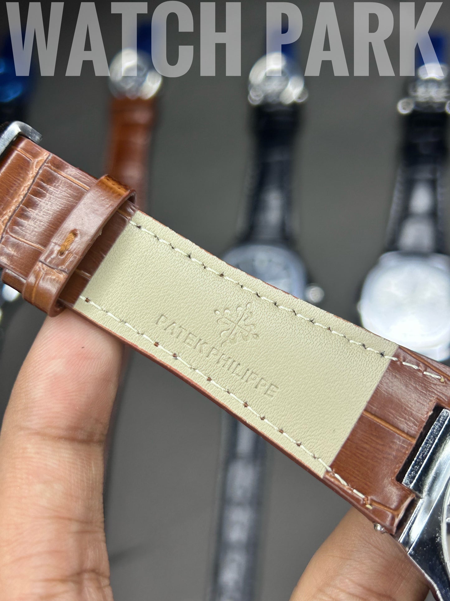 Patek Philippe Aquanaut - Black dial - Brown belt