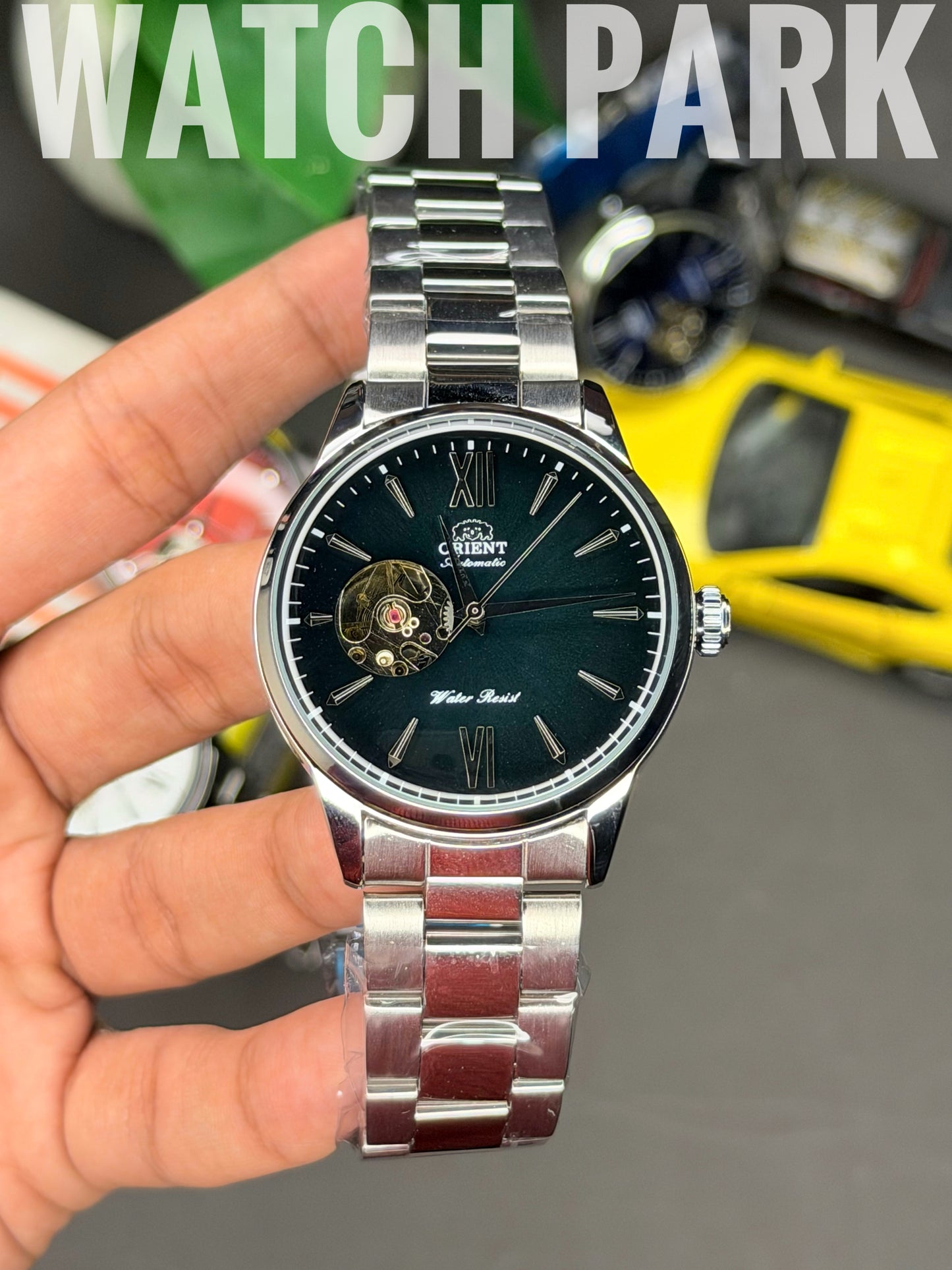 Orient - Bambino Open Heart - Deep Green dial - Silver chain